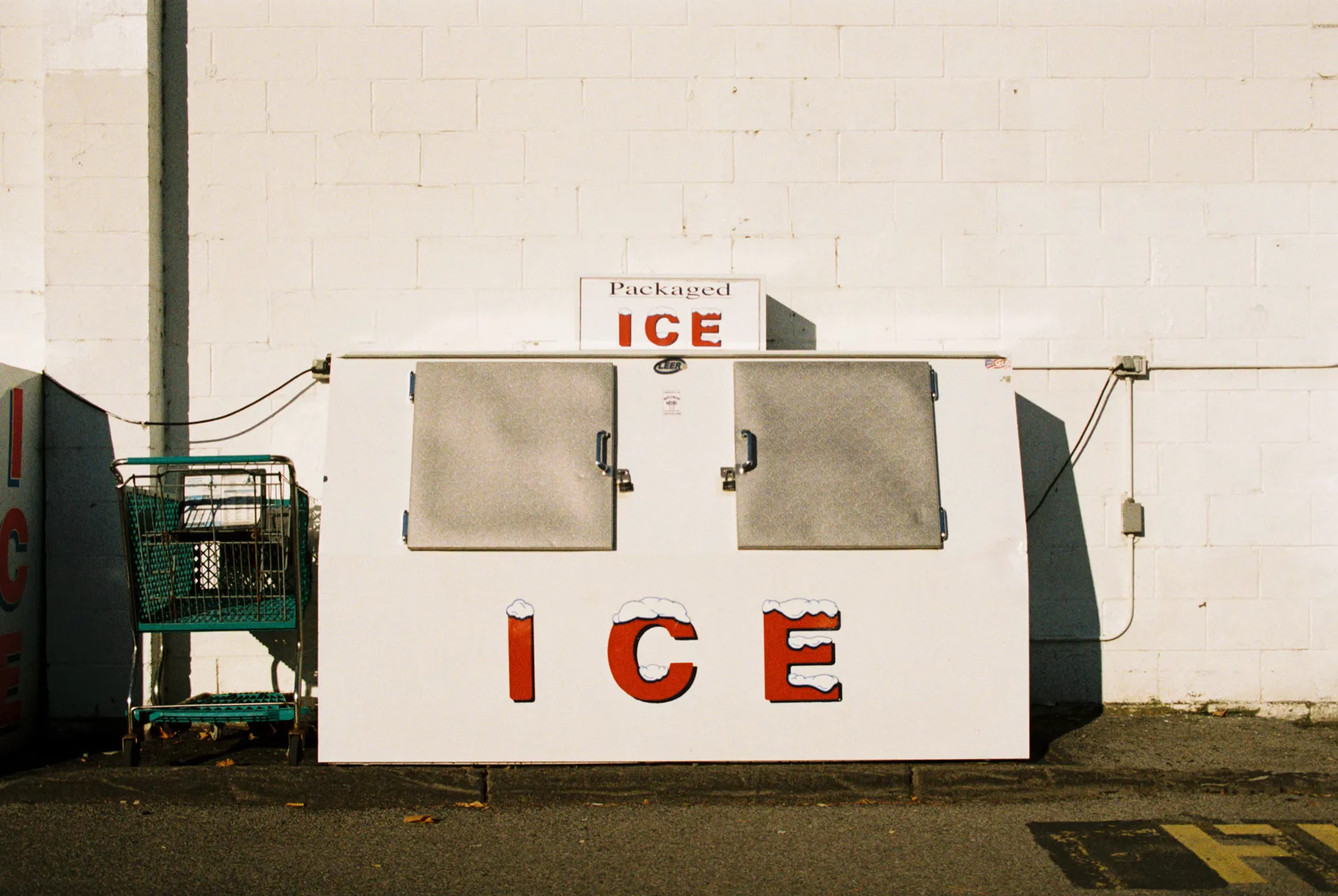 Ice merchandiser freezer installed outdoors